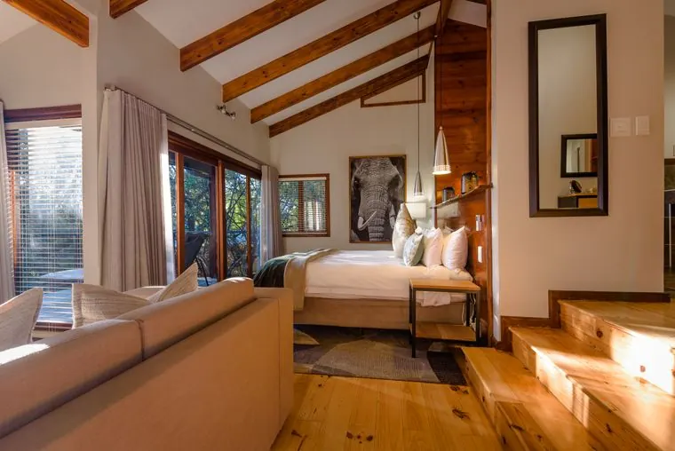 The suite from the lounge, with steps up to the dressing area