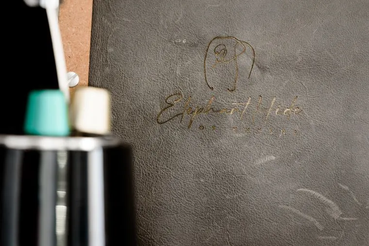 The Elephant Hide logo on leather