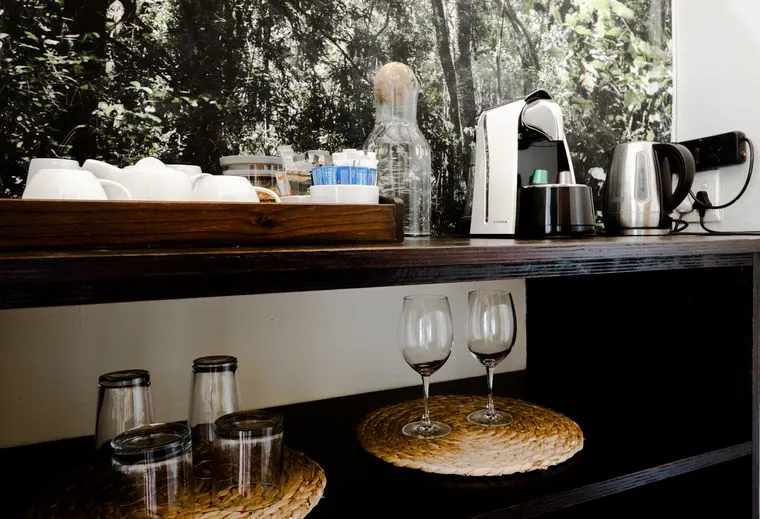 Coffee machine and glasses at the refreshment station